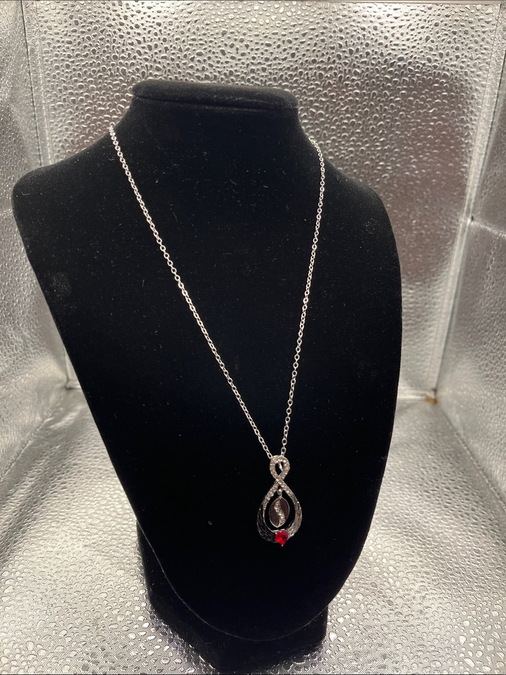 Silver Tone Infinity Pendant Necklace with Red Accent